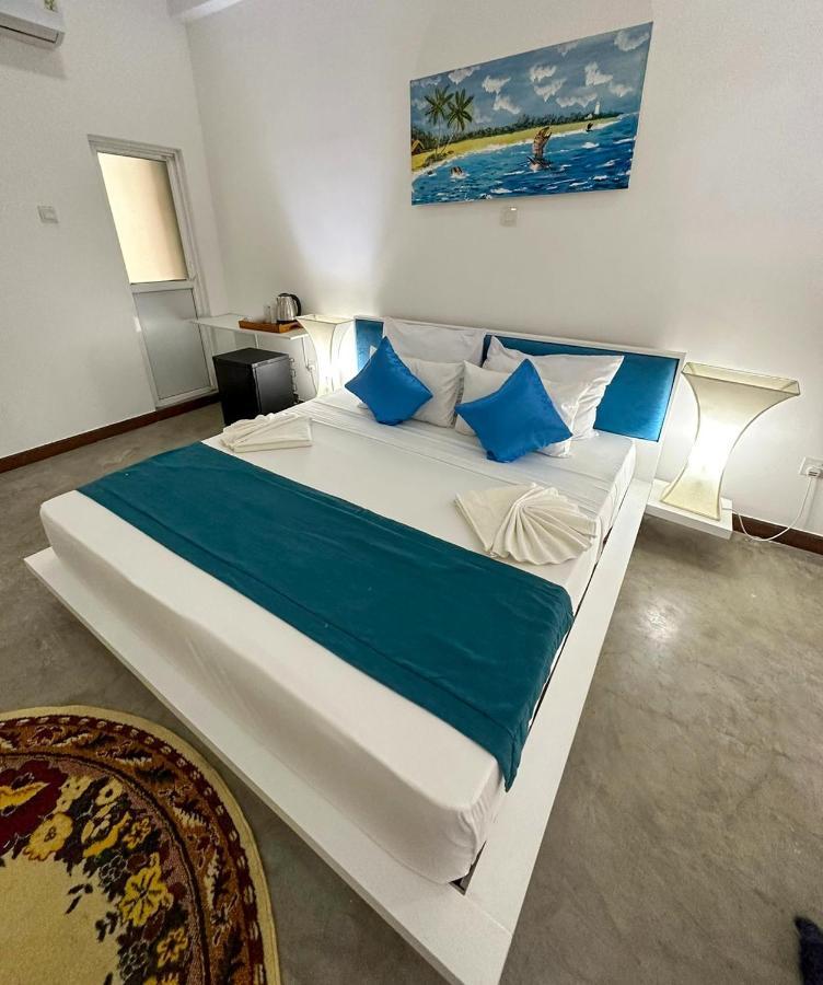 Sunset Sands Хіккадува Номер фото